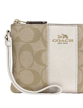 Coach Corner Zip Wristlet In Signature Canvas