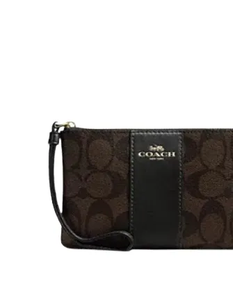 Coach Corner Zip Wristlet In Signature Canvas